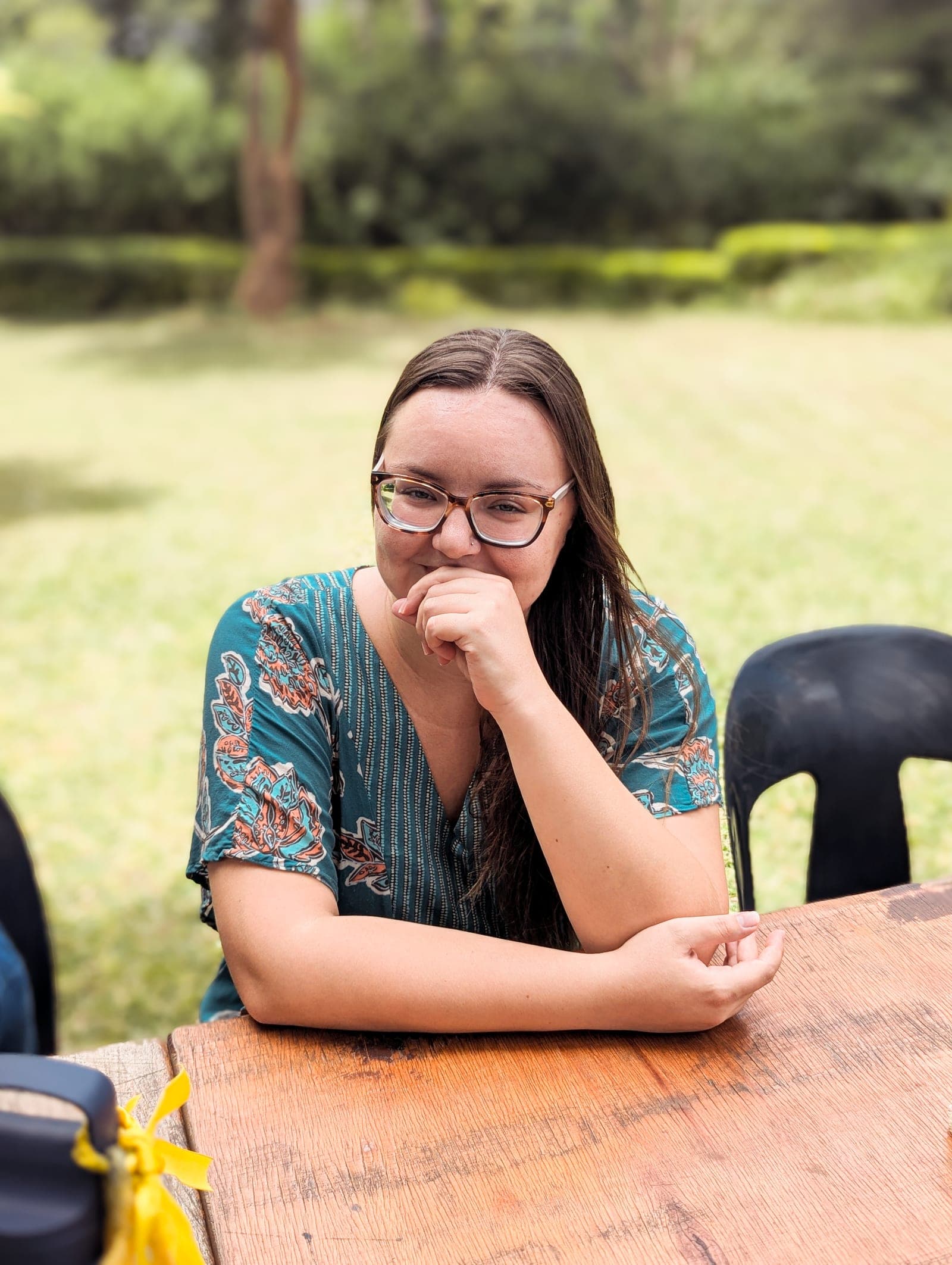A member of the Birth Attendant School team listening during a conversation at the base