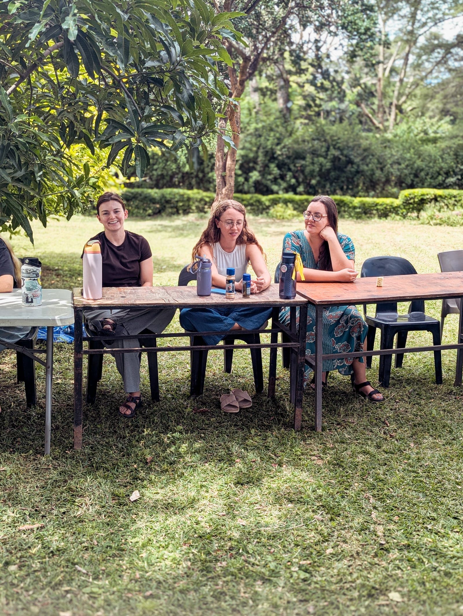 The Birth Attendant School team from YWAM Perth sitting together outdoors at the YWAM Lusaka base